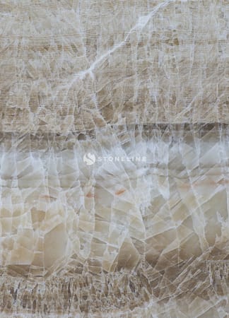 Close-up of beige onyx marble texture.