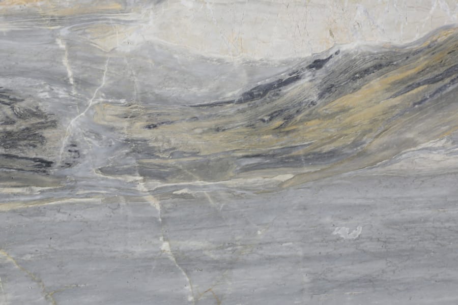 Close-up of textured marble surface with gray tones.