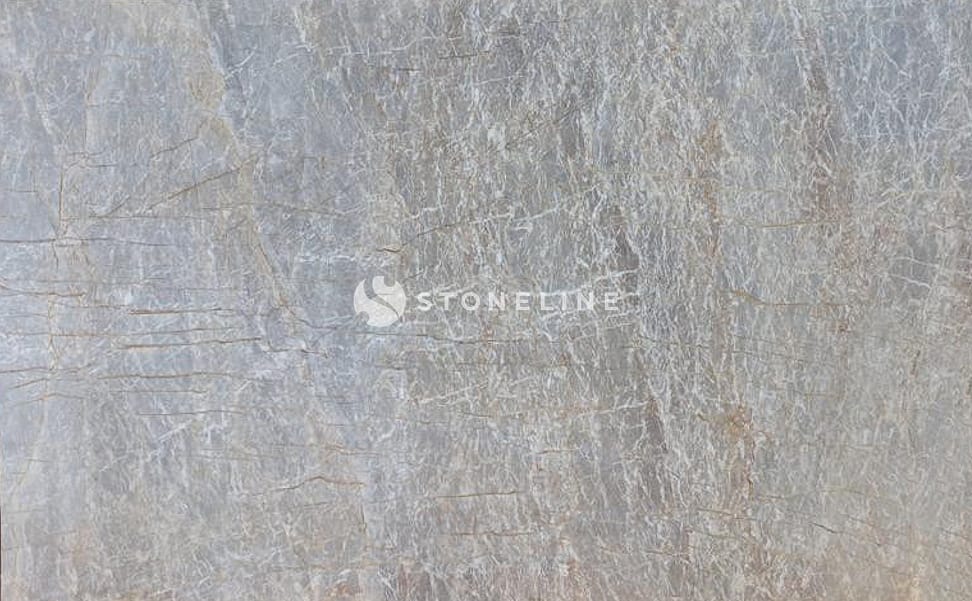 Gray textured stone surface with natural patterns.