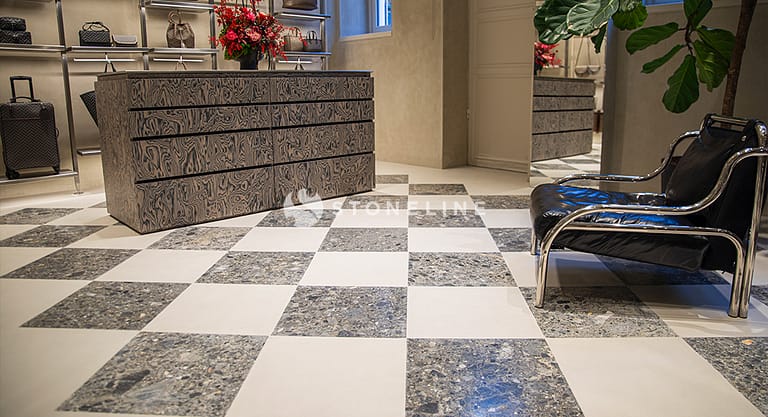 Luxury store interior with checkered floor and furniture.