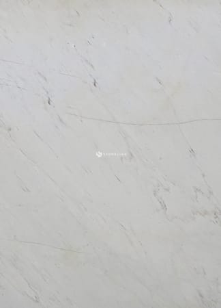 Close-up of white marble texture with veins
