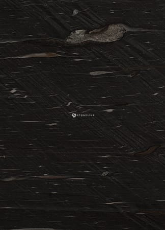 Dark textured stone surface, close-up view.