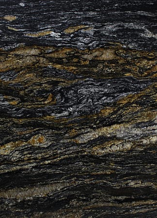 Close-up of textured black and gold marble surface.