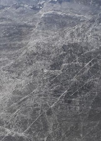 Close-up of textured gray stone surface.