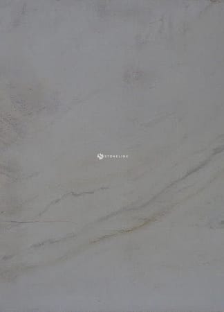 Close-up of light beige marble texture.