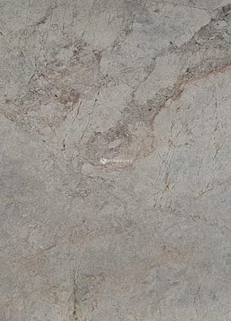 Close-up of gray stone texture with natural patterns.