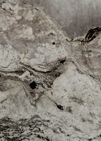 Close-up of textured gray stone slab surface.