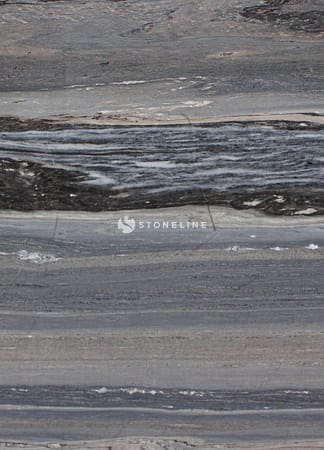 Close-up of gray marble texture with dark veins.