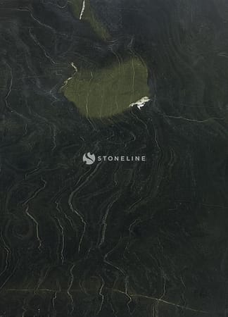Dark textured stone surface with greenish hues.