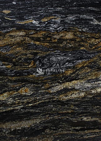 Close-up of textured black and gold marble surface.