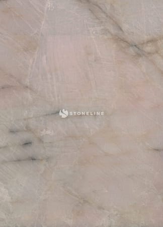 Close-up of pink marble texture with veins.