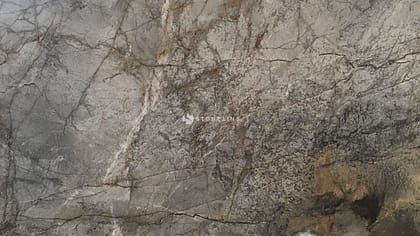 Natural stone texture with gray and brown patterns.