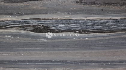 Close-up of gray marble texture with dark veins.