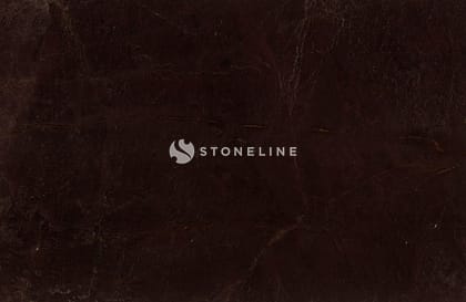 Dark brown textured marble surface