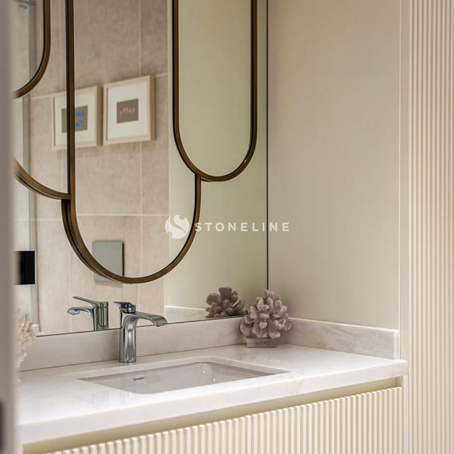Modern bathroom with decorative mirror and sink