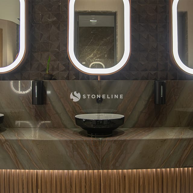 A photo of a quartzite slab with a bold veining pattern.