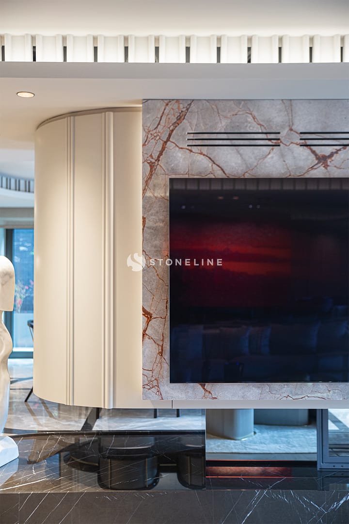Modern living room with marble TV wall.