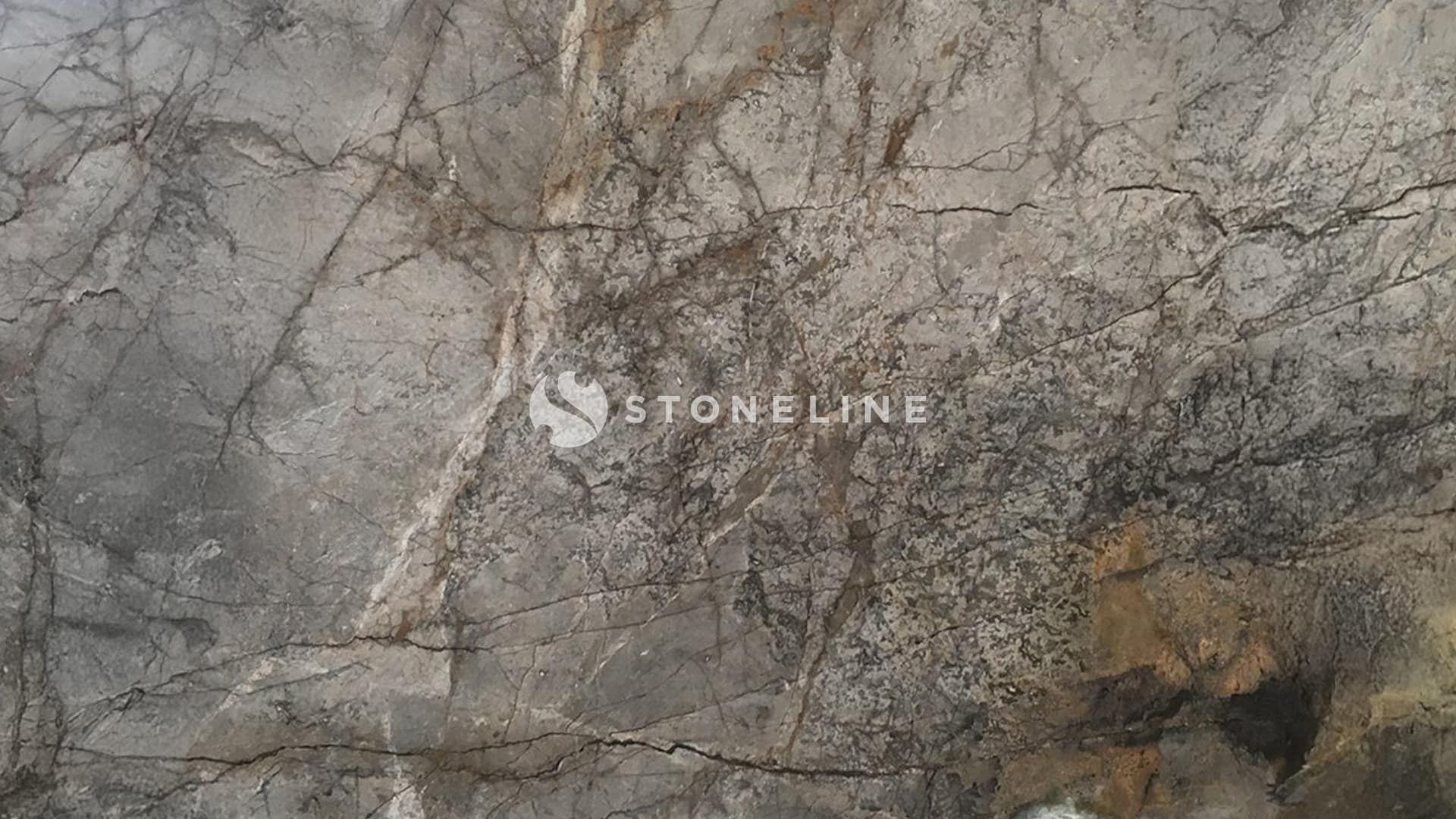 Natural stone texture with gray and brown patterns.