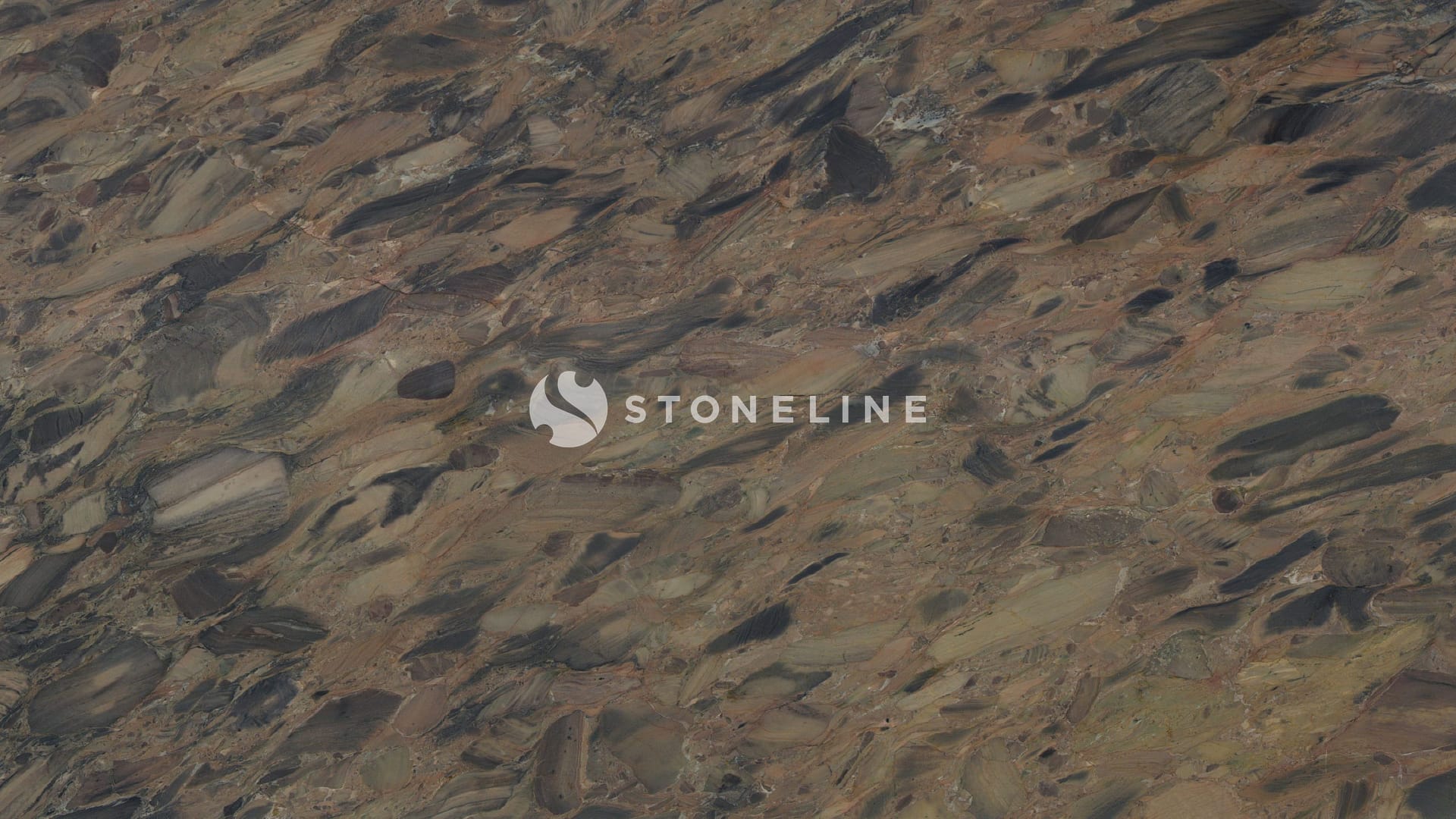 Aerial view of textured rocky desert landscape.