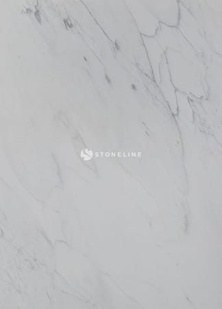 Close-up of green marble texture with veins.