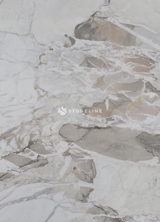 White marble texture with gray and brown veins.