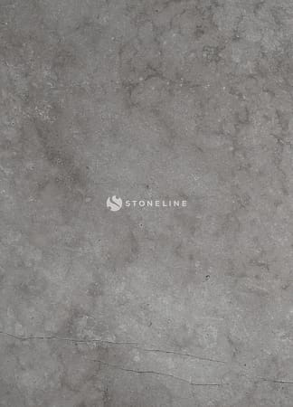 Close-up of gray marble texture with veins.