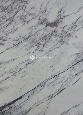Close-up of gray marble texture with veins.