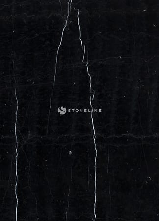 Close-up of black marble surface with white veins.