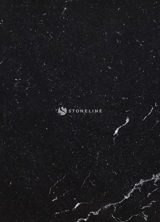 Close-up of black marble texture with white veins.