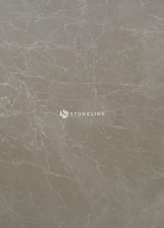 Beige marble surface with white veins