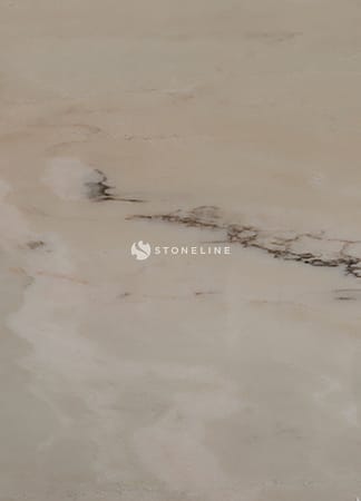 Close-up of beige marble texture with veins