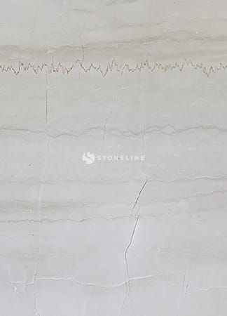 Light marble texture with subtle veins and cracks.