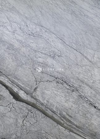 Gray marble texture with natural veining patterns.