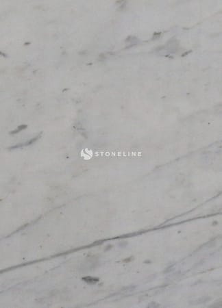 Close-up of grey marble texture with veins