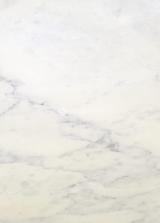 White marble surface with light gray veins