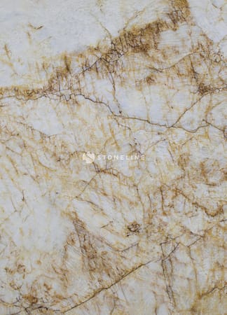 Close-up of polished marble surface with brown veins.
