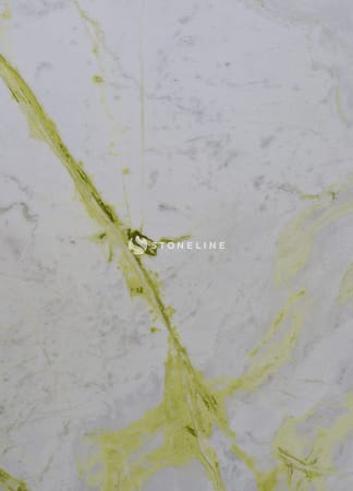 Marble surface with greenish-yellow veins