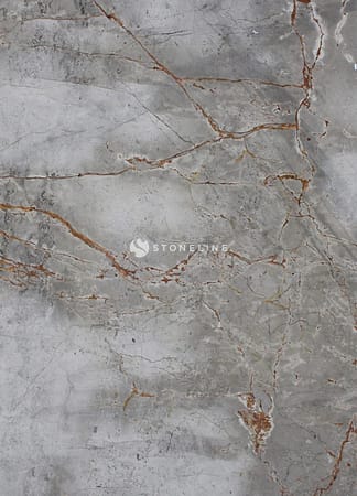 Close-up of gray marble texture with brown veins.