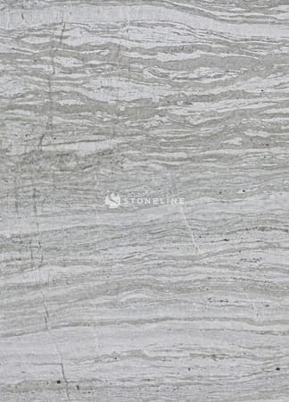 Close-up of gray marble texture with wavy patterns.