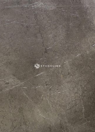 Close-up of dark marble texture with veins.