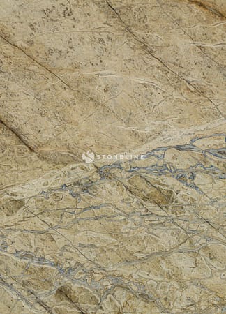 Close-up of textured beige and blue stone surface.