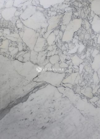 Close-up of white marble texture with gray veins.