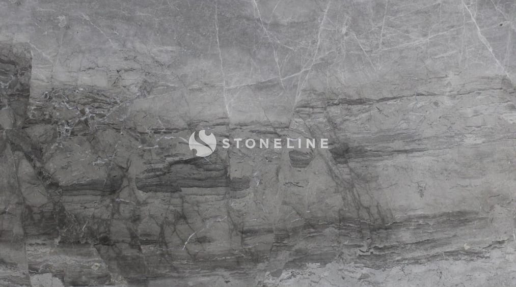 Close-up of gray stone texture with veins.