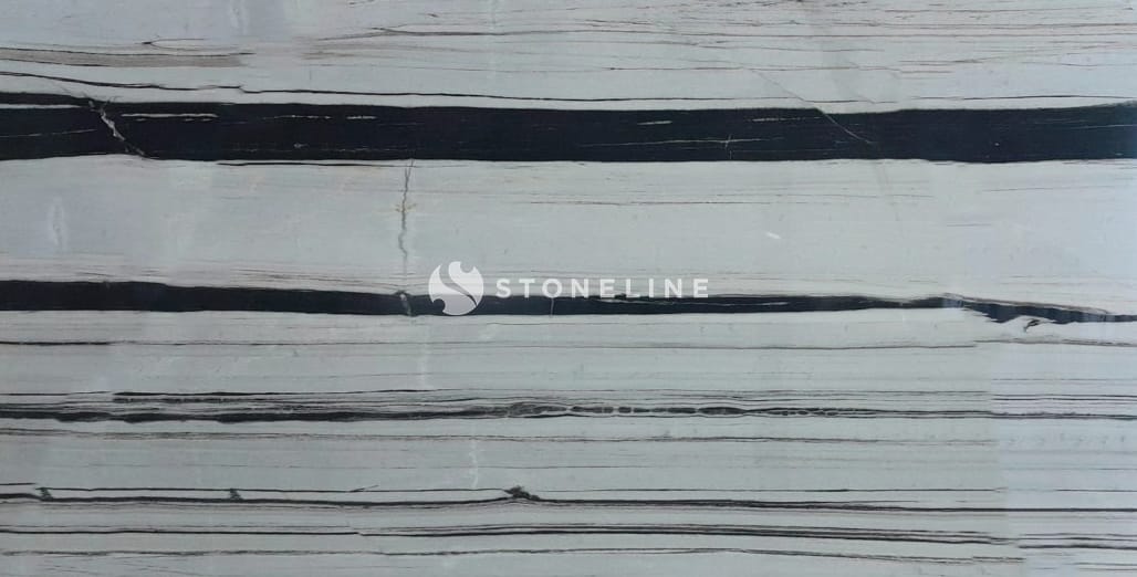 Close-up of striped black and white stone pattern.