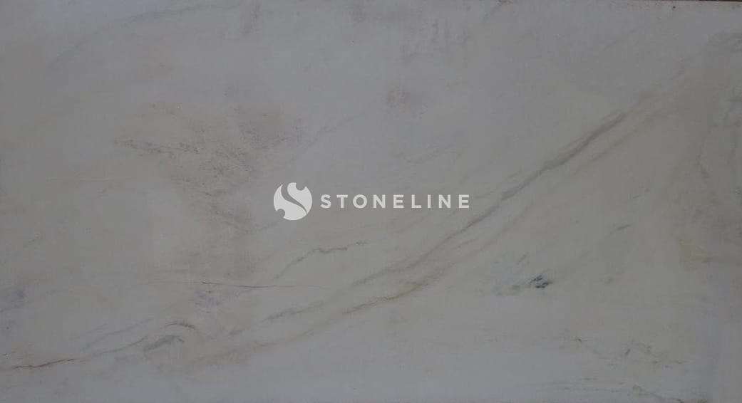 Close-up of light beige marble texture.