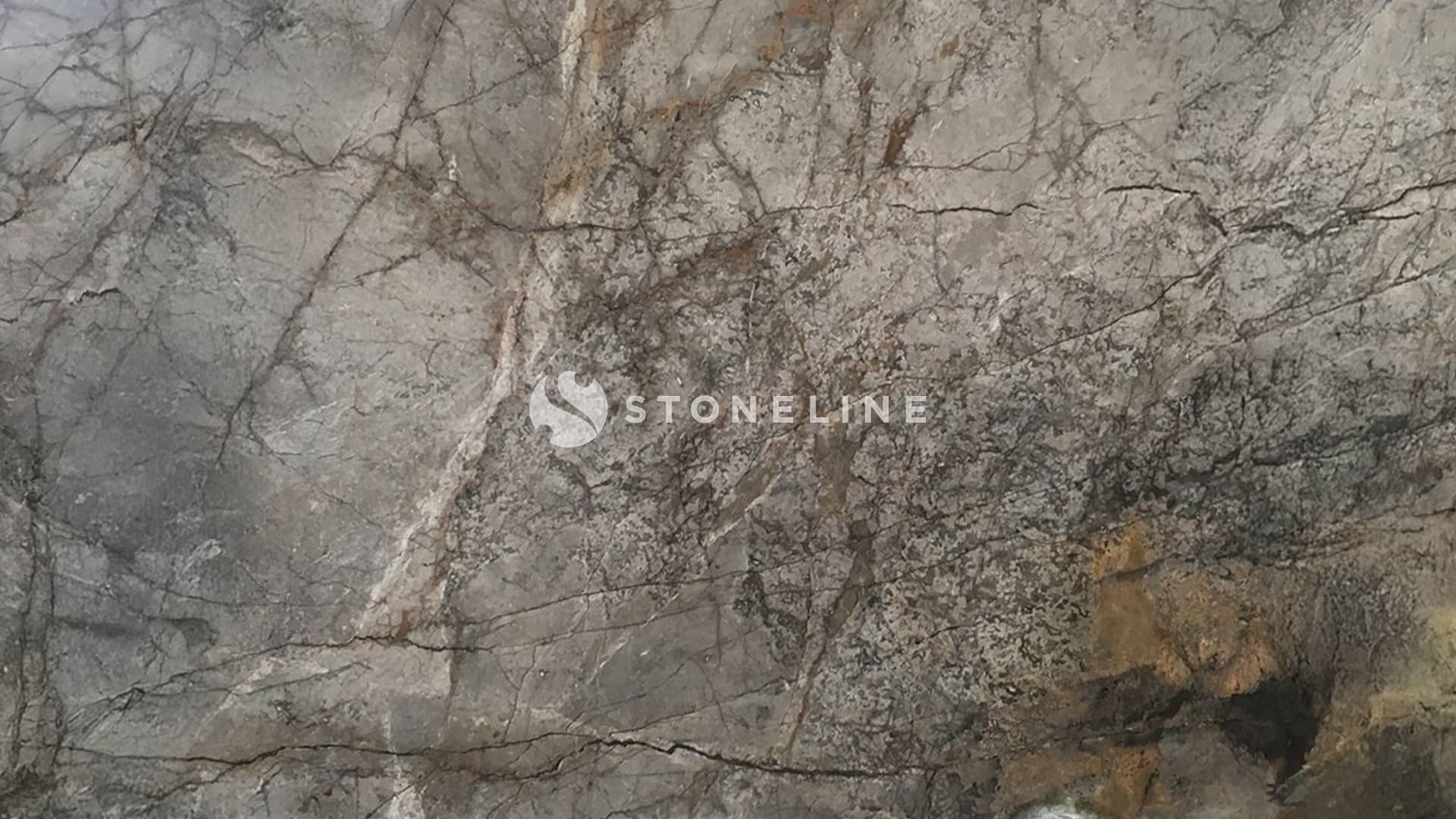 Natural stone texture with gray and brown patterns.