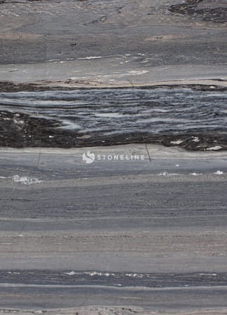 Close-up of gray marble texture with dark veins.