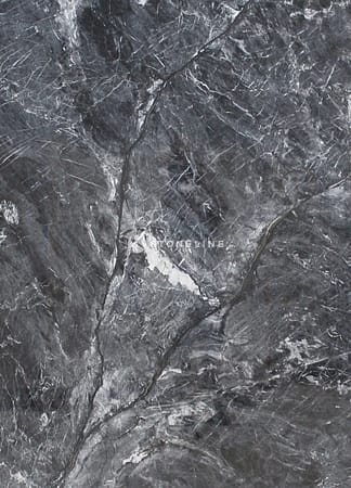 Close-up of textured gray marble surface.