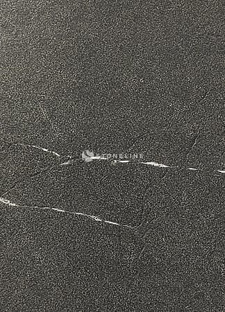 Dark stone texture with white veins