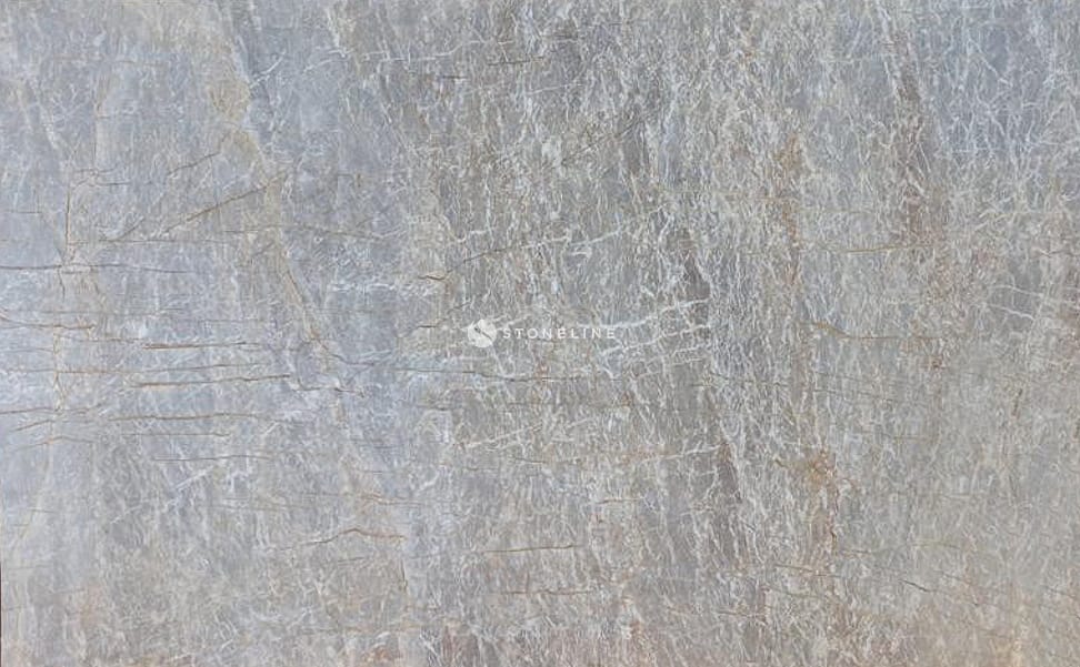 Gray textured stone surface with natural patterns.